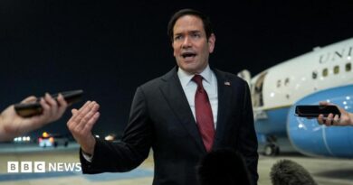 Secretary of State Marco Rubio speaking to reporters after landing in Abu Dhabi