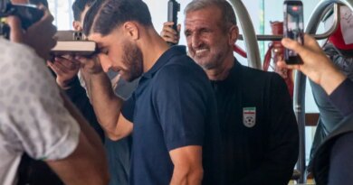 Iran national soccer team member Alireza Jahanbakhsh touches his forehead to the Quran as he departs from the Tijuana Marriott in Tijuana, Mexico on Saturday June 20, 2026. (AP Photo/Gabriela Aoun Angueira)