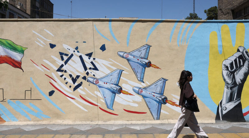 US says it struck Iranian military sites, Tehran responds with air base attack