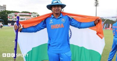 Vaibhav Sooryavanshi holds up an India flag to celebrate winning the Under-19 World Cup