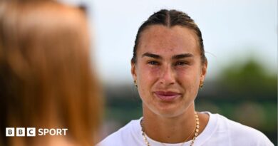 Aryna Sabalenka talks to the media