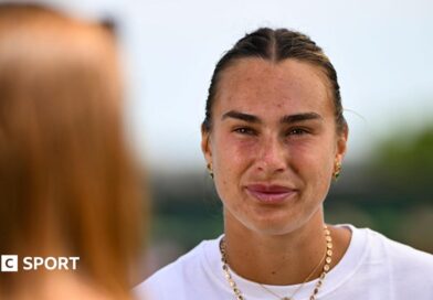 Aryna Sabalenka talks to the media