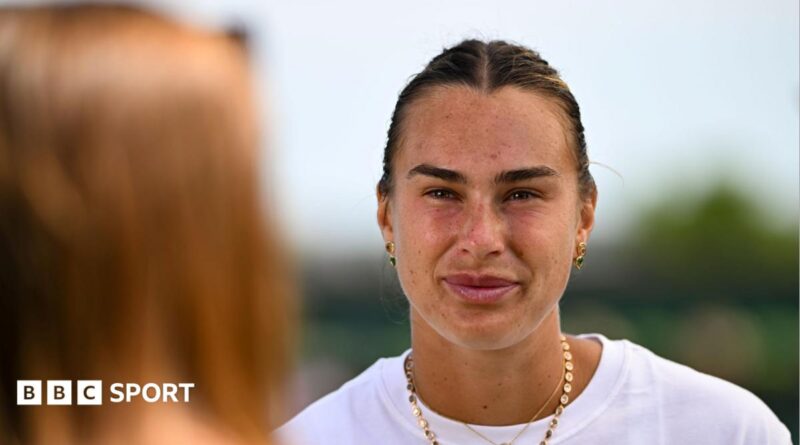 Aryna Sabalenka talks to the media