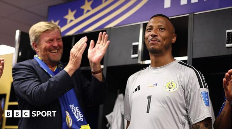King Willem-Alexander of the Netherlands and Curacao goalkeeper Eloy Room