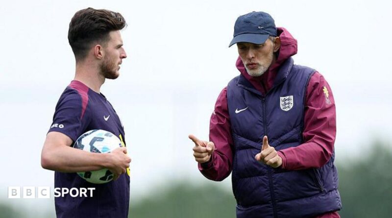 Declan Rice and Thomas Tuchel talking in England training