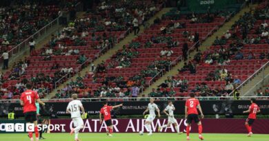 South Korea and Czech Republic play in front of a stand with a number of empty seats
