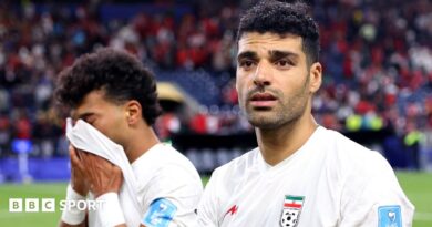 Ramin Rezaeian and Mehdi Taremi of Iran deflated after draw with Egypt at 2026 World Cup
