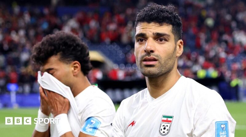 Ramin Rezaeian and Mehdi Taremi of Iran deflated after draw with Egypt at 2026 World Cup