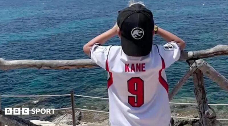 Child in Harry Kane shirt
