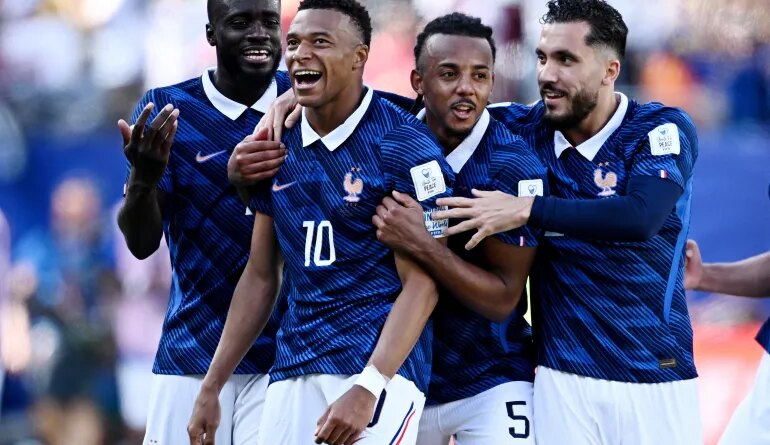 France's Kylian Mbappe celebrates scoring their third goal with Dayot Upamecano, Jules Kounde and Rayan Cherki