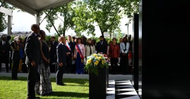(From L) Rwanda's President Paul Kagame, Rwanda's First Lady Jeannette Kagame and France's President Emmanuel Macron stand after laying wreaths of flowers on a monument for honouring the victims of the Rwanda's genocide made by the Portuguese artist Grada Kilomba, during a ceremony on the Habib-Bourguiba Esplanade along the Seine River in Paris, on June 2, 2026. (Photo by Sarah Meyssonnier / POOL / AFP) / RESTRICTED TO EDITORIAL USE - MANDATORY MENTION OF THE ARTIST UPON PUBLICATION - TO ILLUSTRATE THE EVENT AS SPECIFIED IN THE CAPTION