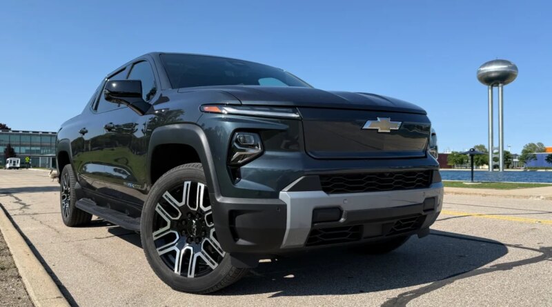 A Silverado EV stands with its front wheels turned.
