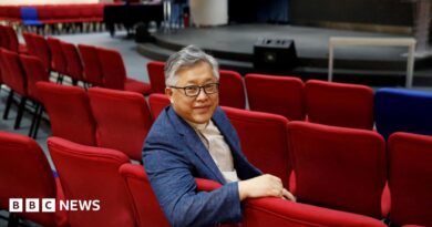 The head pastor of the Zion church in Beijing Jin Mingri poses for picures in the congregation hall of the unofficial Protestant "house" church in Beijing, China, 2018.