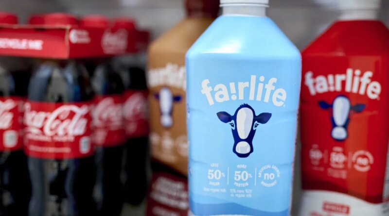 Fairlife ultra-filtered fat free, whole, and chocolate milk and Coca-Cola bottles arranged in Germantown, New York, US, on Tuesday, Dec. 3, 2024. Fairlife, which uses a specialized filtering process to boost protein and cut sugar and lactose in its milk products, helped spark the modern protein craze that's unfolded alongside the rise of Ozempic and other GLP-1 drugs. Photographer: Gabby Jones/Bloomberg via Getty Images