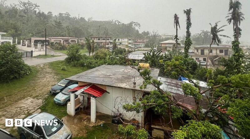 This picture shows a general view of a residential area as rain falls ahead of the arrival of the forecasted Super Typhoon Bavi in Saipan, Northern Mariana Islands, on July 5, 2026.