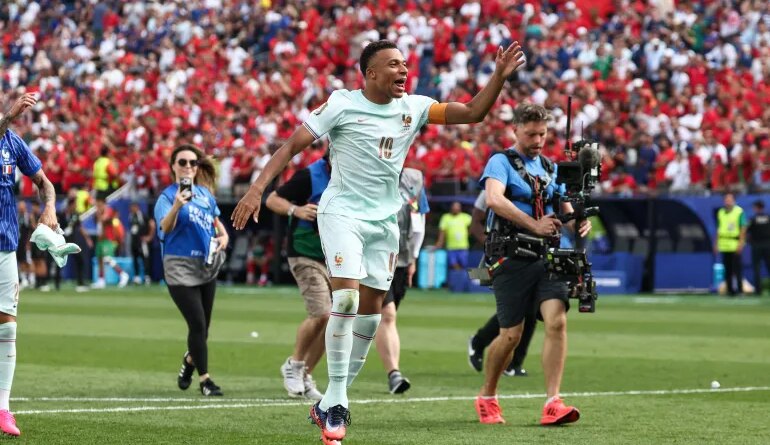 Kylian Mbappe reacts.