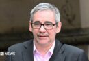 Former River City actor Iain Robertson jailed for nine years for rape Rachel, a woman with straight shoulder-length blonde hair wearing a graduation cap. She has a nose stud, and wears light pink lipstick.