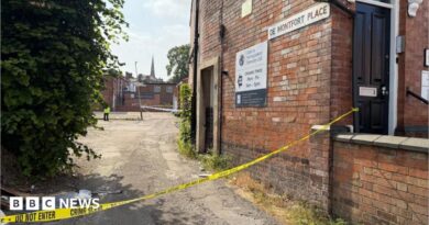 A general view of a police cordon with the words 'do not enter' blocking an entrance to De Montford Place in Leicester.