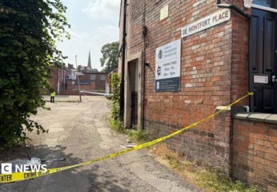 A general view of a police cordon with the words 'do not enter' blocking an entrance to De Montford Place in Leicester.