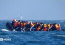 A young person wearing a baseball cap and a backpack and carrying a suitcase stands in the middle of the image. To the left of the image a passport with a boarding card is held up. To the right of the image is a migrant family of a man, woman and child on a beach, walking. In the top right corner is a partial view of a UK visa document