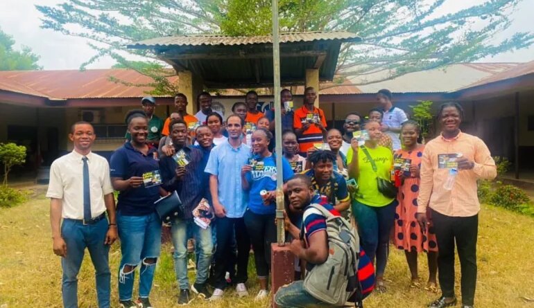 Participants in an Archive Liberia oral history project pose for a group photograph
