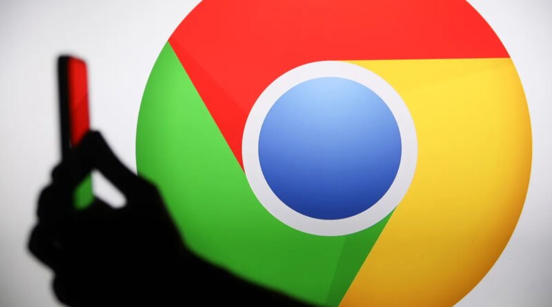 The Chrome logo displays on a screen with a person holding a phone.