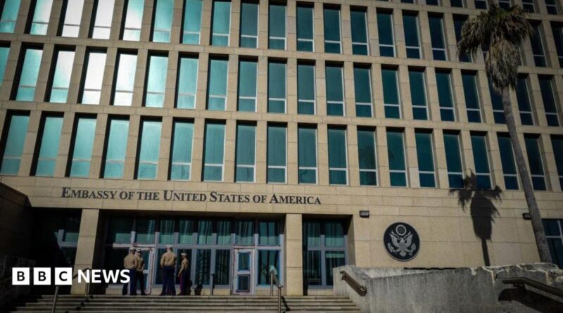 US Marines stand outside the Embassy of the United State of America in Havana, on February 21, 2018