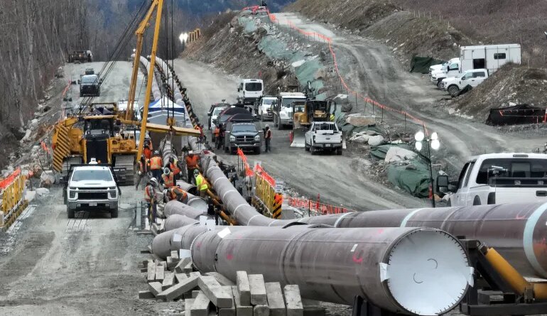 FILE PHOTO: The last section of pipeline is assembled on the Trans Mountain pipeline expansion project before operations are expected to begin in the second quarter of 2024, near Laidlaw, British Columbia, Canada, February 18, 2024. REUTERS/Chris Helgren/File Photo