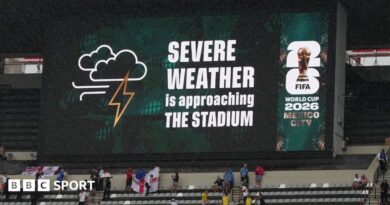 A sign displays 'Severe weather is approaching the stadium' at Mexico City's Azteca Stadium