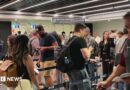 People move through the queue for the Entry Exit System process at Fuimicino Airport in Rome, Italy.