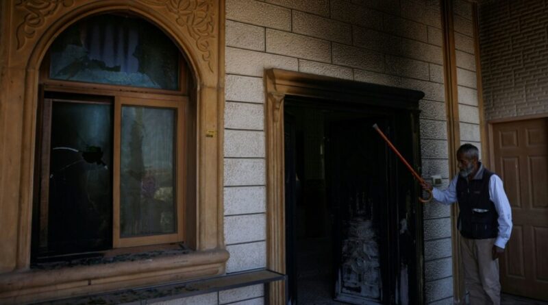 Palestinians say Israeli settlers torch mosque, factory