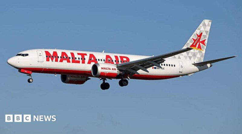 A Malta Air flight in the air