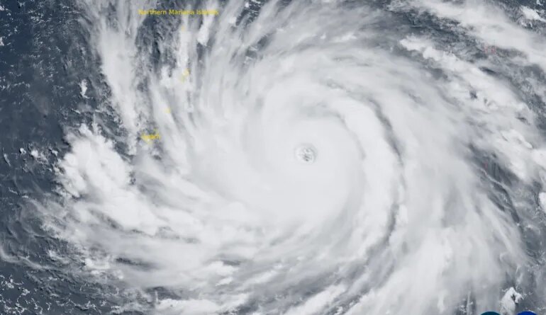 This satellite image handout from the Cooperative Institute for Research in the Atmosphere (CIRA) in partnership with the Regional and Mesoscale Meteorology Branch (RAMMB/NOAA) and the Colorado State University (CSU) taken on July 5, 2026 at 01:20 UTC shows the super typhoon Bavi as it develops and nears Guam and the Northern Mariana islands in the western Pacific Ocean.