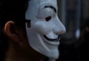 A member of the international organisation Anonymous for the Voiceless wears a Guy Fawkes mask while demonstrating in the streets of Mexico City's Historic Center.