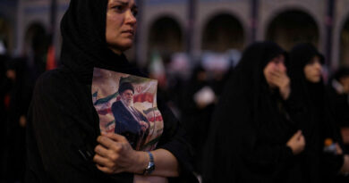 Three sons of Iran's slain leader Khamenei appear at funeral, not his successor