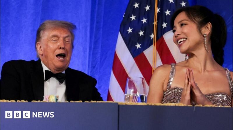 Trump reacts next to CBS News senior White House correspondent and White House Correspondents' Association President (WHCA) Weijia Jiang at the WHCA Dinner