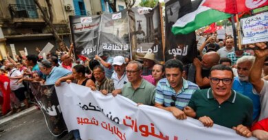 People gather to protest Tunisia’s President Kais Saied during a demonstration marking five years since his suspension of parliament and assumption of emergency powers, in Tunis on July 25, 2026 [AFP]