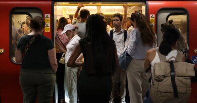 Commuters travel on a London Underground tube carriage, during a heatwave, in central London on June 24, 2026.