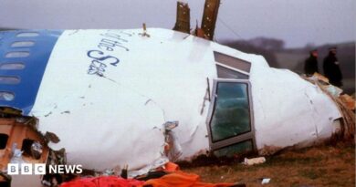 Officials inspect the wreckage of Pan Am flight 103 December 21, 1988 in Lockerbie, Scotland.