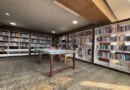A man reads a book inside a library in Srinagar, February 17, 2025