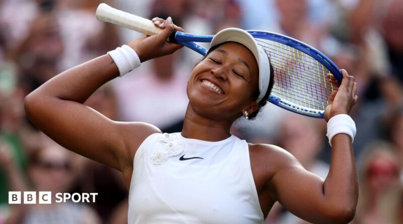 Naomi Osaka clenches her fist in celebration after beating Aryna Sabalenka