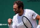 Roman Safiullin celebrates after defeating Joao Fonseca