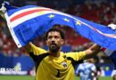 Vozinha holding Cape Verde flag