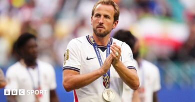 Harry Kane with his World Cup bronze medal