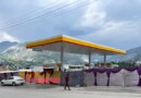 A man walks past a closed fuel station with the entrance blocked off by a cloth in the background, during a shutdown strike called by the recently banned Joint Awami Action Committee (JAAC), an alliance of civil society groups, in Muzaffarabad, Pakistani Kashmir, June 19, 2026. Picture taken with a mobile phone. REUTERS/Naseer ud Din