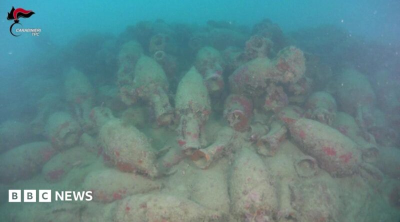 Dozens of barnacle-crusted jars seen on the sea bed
