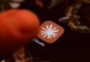 The Claude app icon is displayed on a smartphone screen
