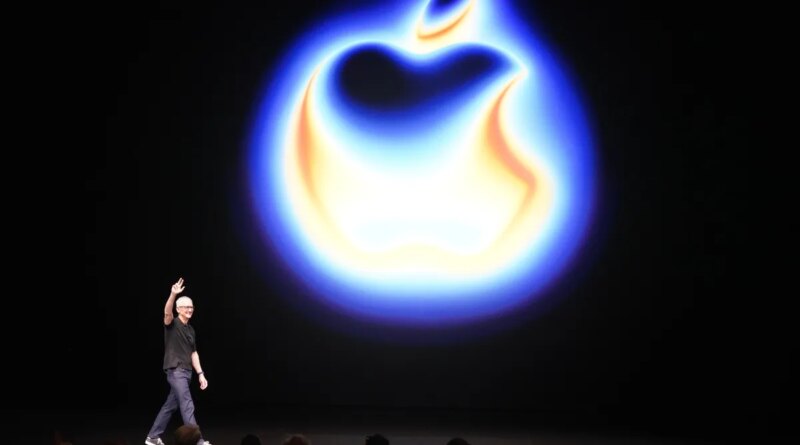 Apple CEO Tim Cook attends a product launch event.