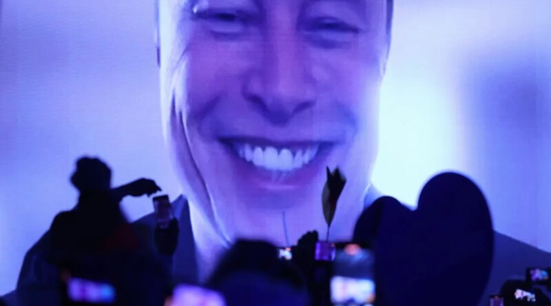 Tech billionaire Elon Musk speaks live via a video transmission during the election campaign launch rally of the far-right Alternative for Germany (AfD) political party on January 25, 2025 in Halle, Germany
