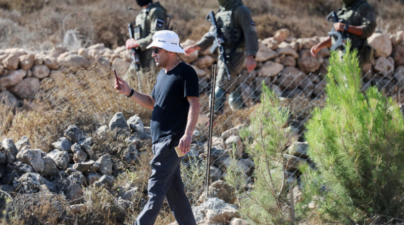 Exclusive-Israeli settler confronts Palestinian American at his besieged West Bank home